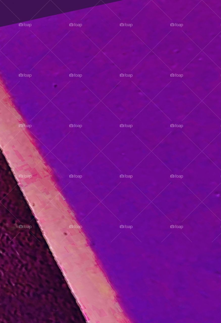 An abstract photograph of shapes and hues making up the composition.