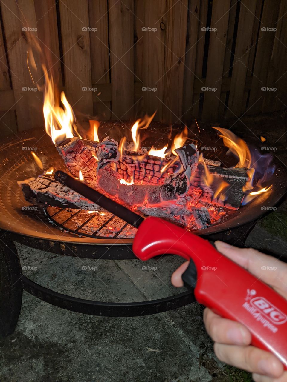 Bic lighter by fire pit