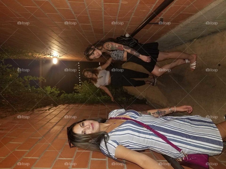 3 beautiful girls in an alley