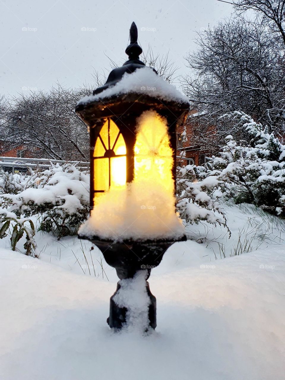 Bright lantern in the snow