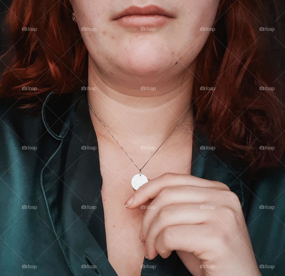 A silver pendant commemorating the first meeting