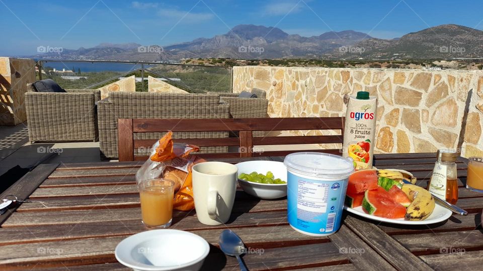 mountain view Greece. breakfast tabke outside