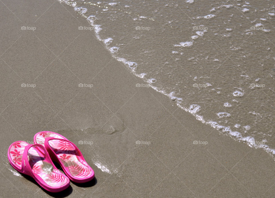 Flip flops on the beach