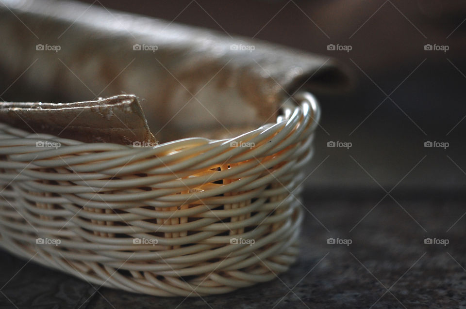 napkin in a wicker basket on the table