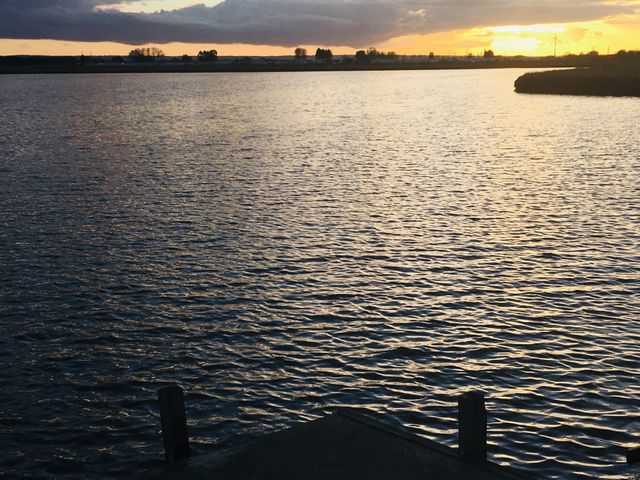 Sitting on the dock of the bay. Such a peaceful and relaxing experience looking over this beautiful lake in Kent at sunset.