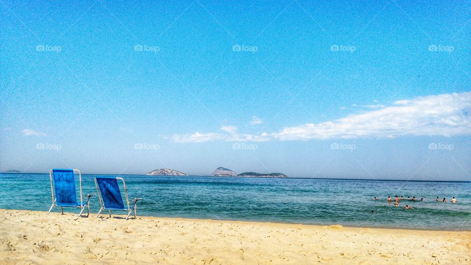 cadeira mar azul areia
