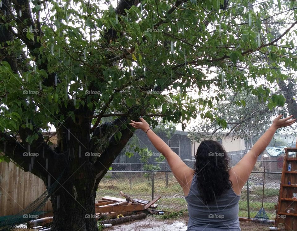 embracing the rain with open arms