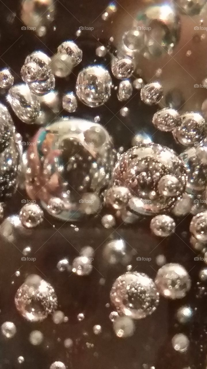 suspended in glass. glass bubbles
