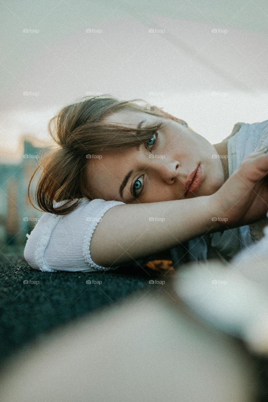 portrait of a beautiful girl at sunset