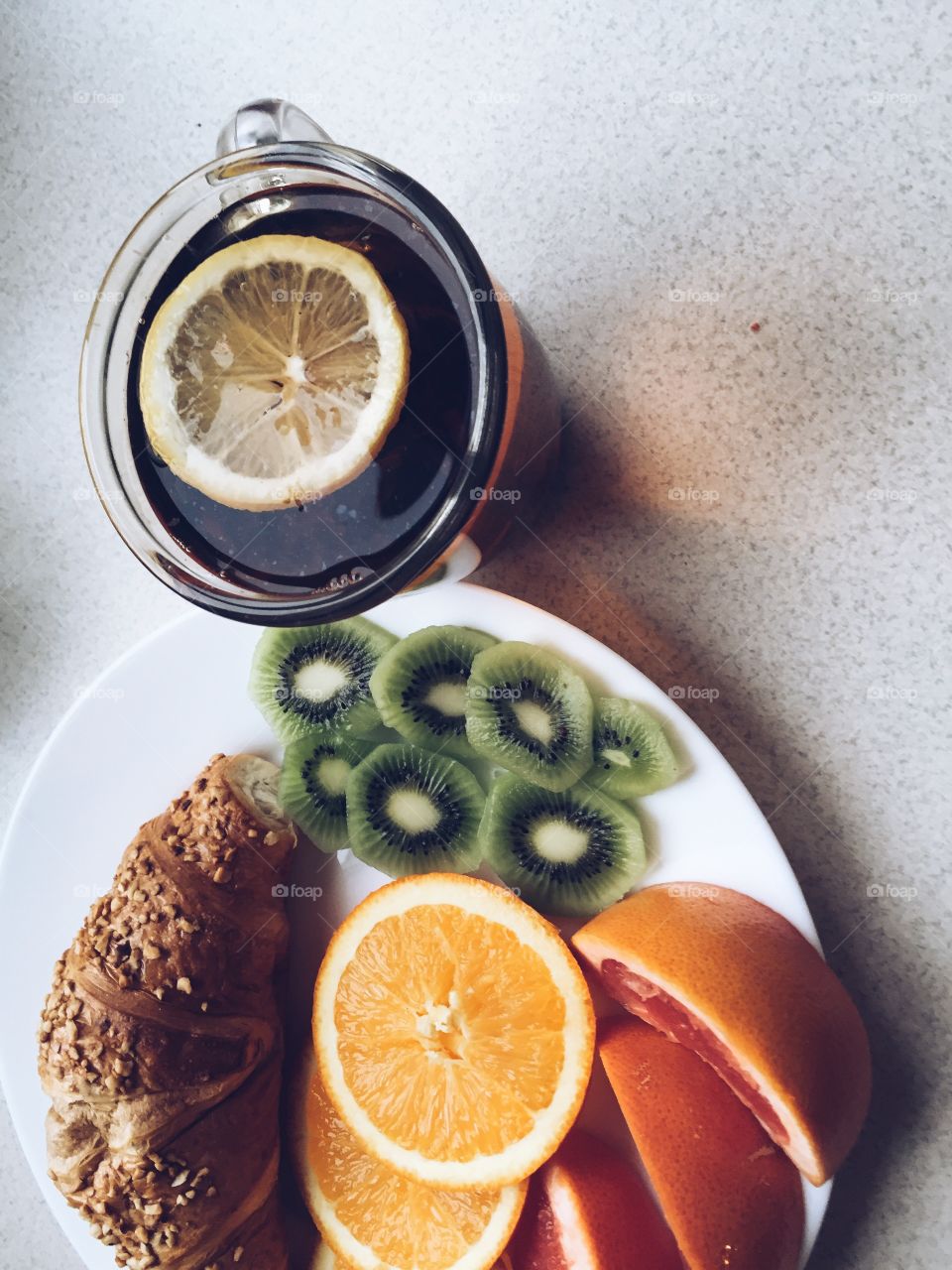 Tea and fruits for breakfast