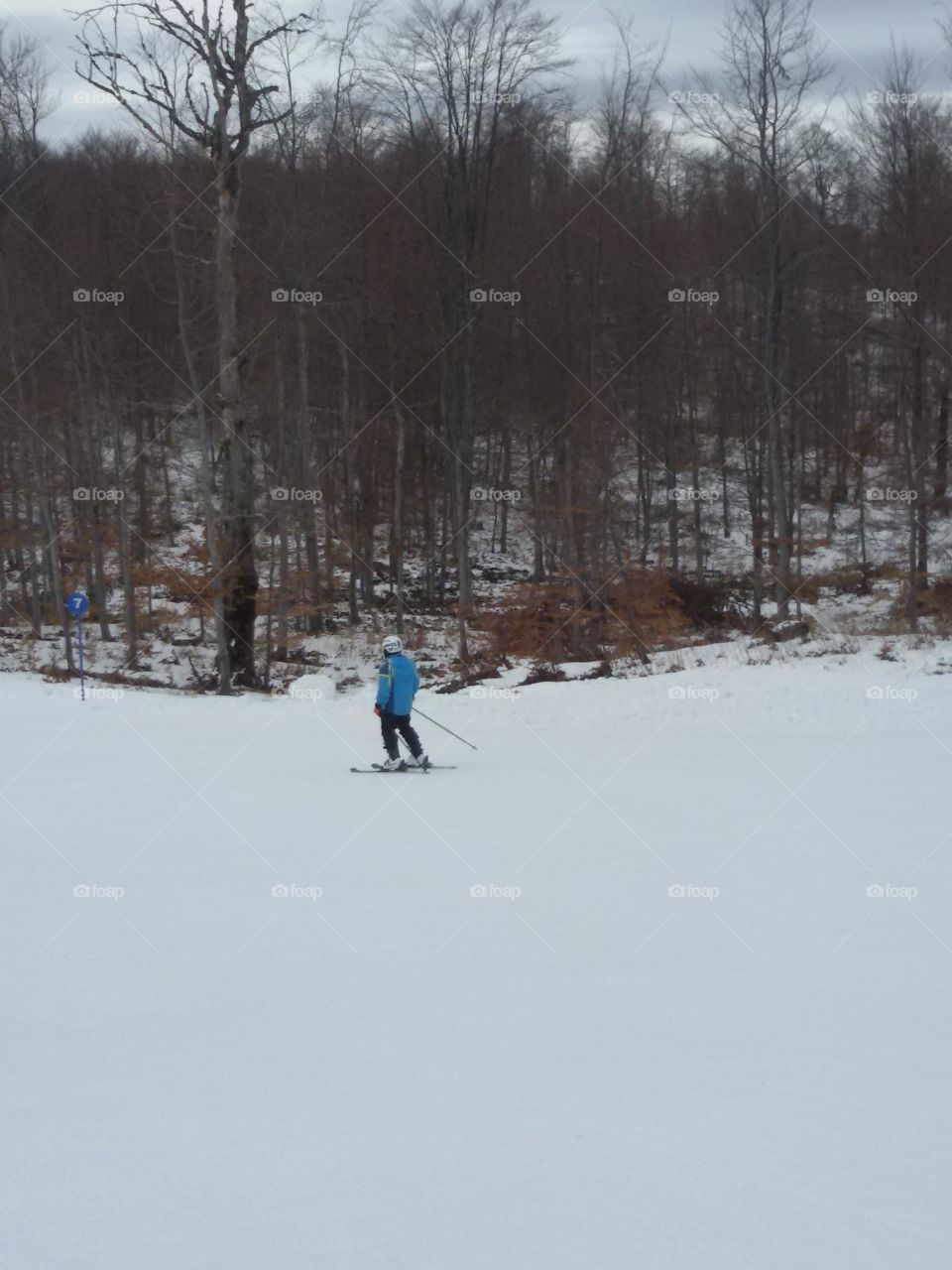 skier on mountain. snow. ice. winter time