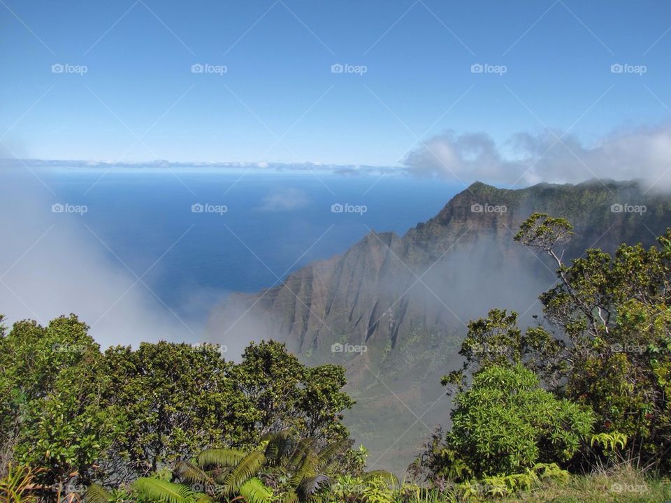 View of a mountain in foggy weather