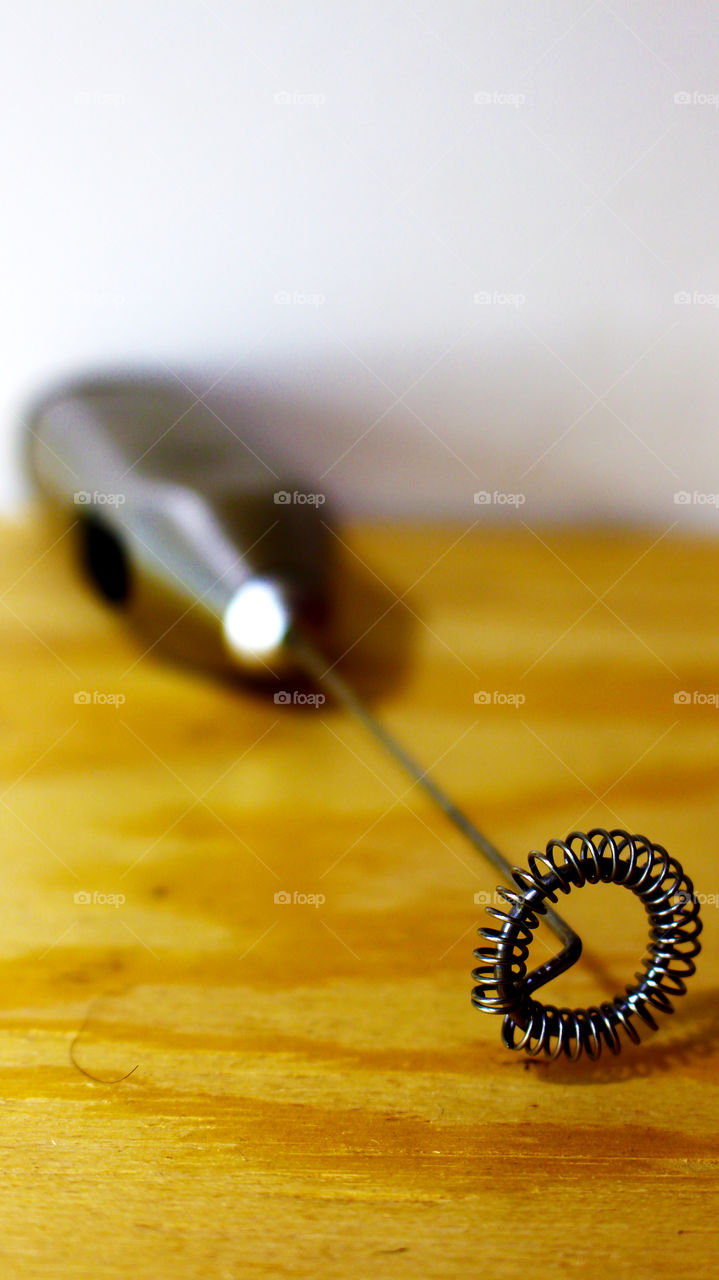 This is a whisk it is a simple very small appliance that is used to make the foam in cappuccino or milk or other drinks. With a little imagination, it also serves as a subject for weird photographs where depth of field can be used.