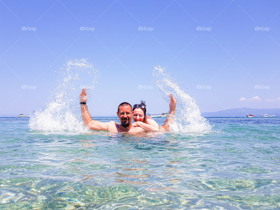 People have fan with sea water. Vacation time.