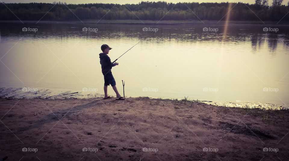 A boy and his fishing rod