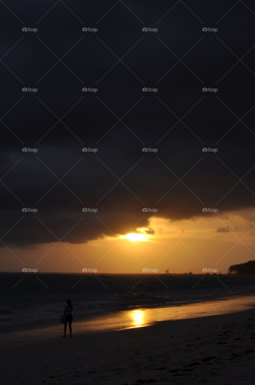 Silhouette of beach at sunrise