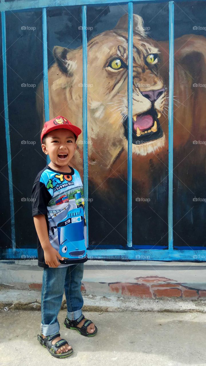 Painting Lion roaring, at the Zoo, Bukittinggi, West Sumatra, Indonesia.