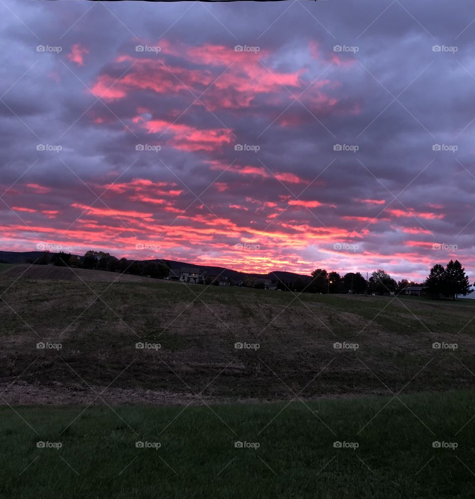 Pink orange clouds and sunrise 