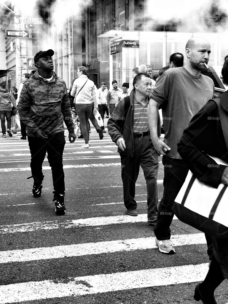 People crossing street near Bryant Park, New York City 