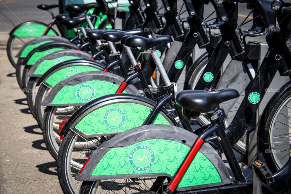 City bikes on a street of a megapolis