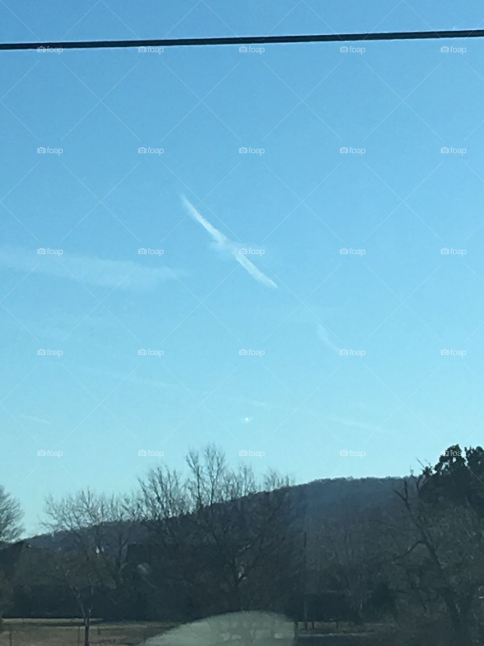 On the way to town today I kept looking at these clouds in amazement. It looks like a Big bird.