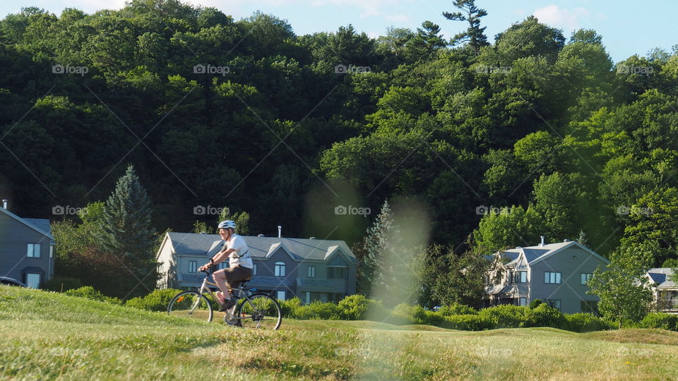 Biker, cyclist riding park