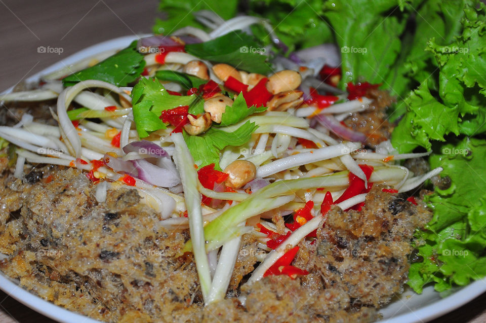 Crispy catfish salad with green mango