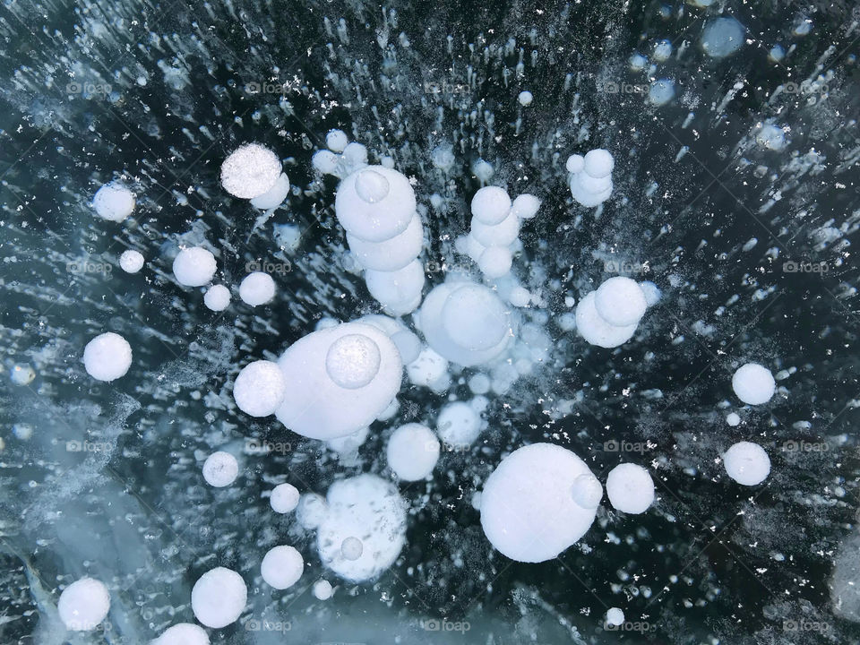 Bubble is going up and freez at Baikal lake in Russia