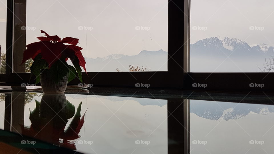 Inside looking out - Reflection of the mountains