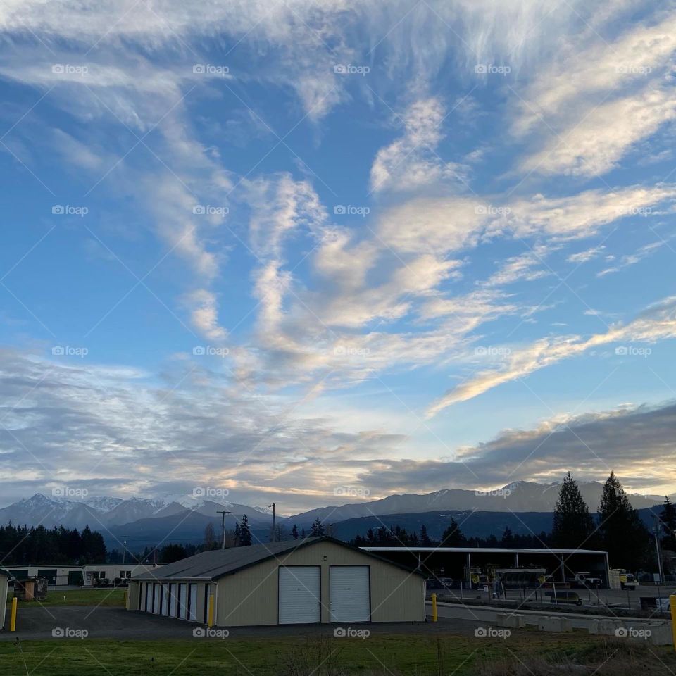 Clouds painting the blue sky