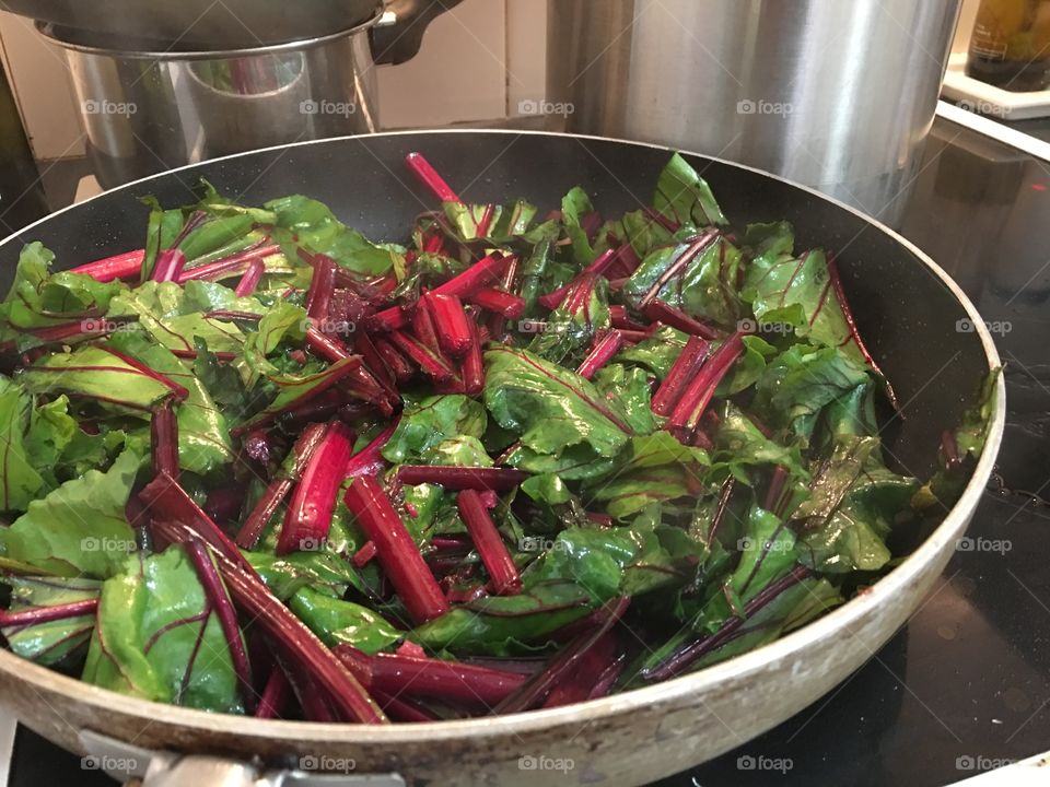 Frying up fresh beet root greens