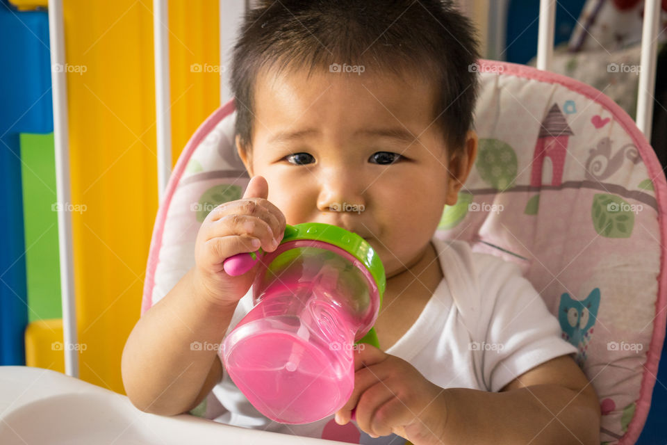 Close-up of a boy drinking water