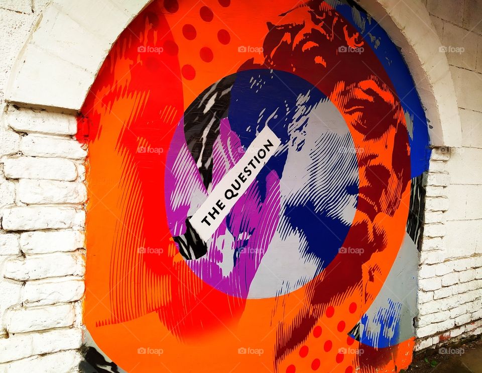 Graffiti with 3D effect.  Vinyl record and a man's face