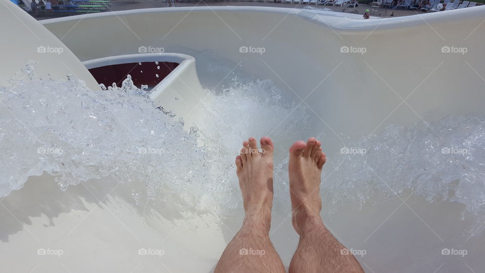 me going down a waterslide at Mustang Aquatic Park in Mustang Oklahoma