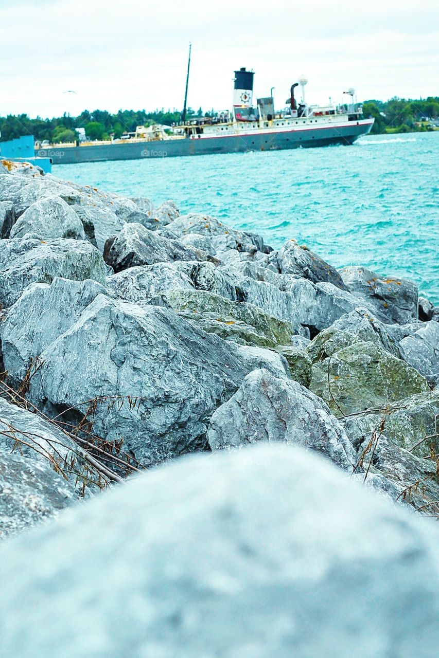 waves and a freighter