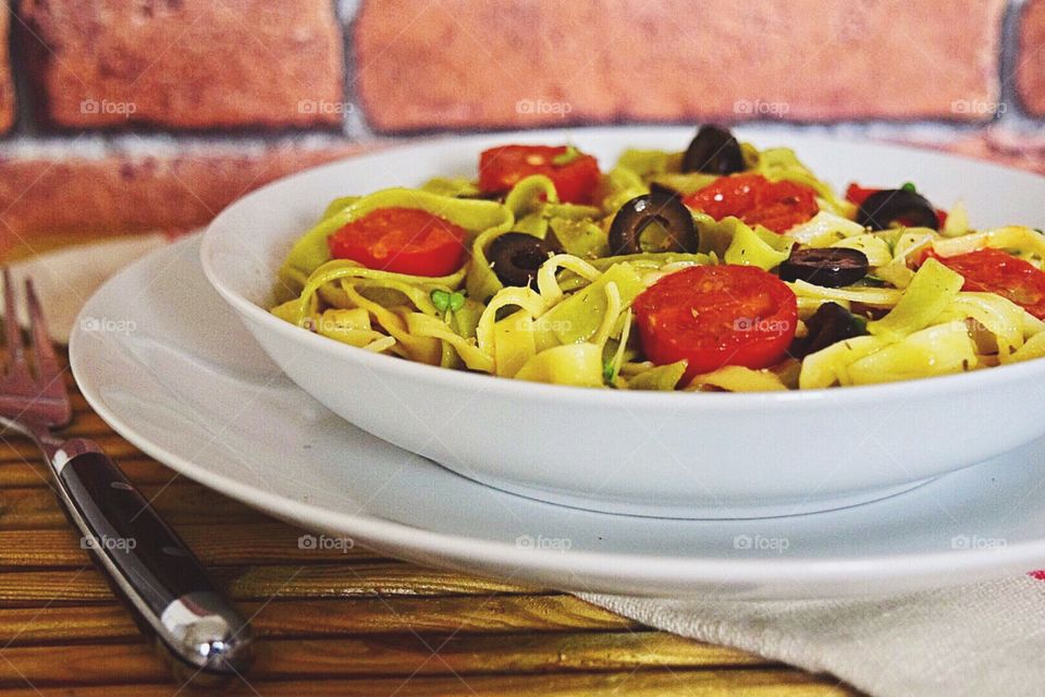 Pasta with tomato and fecttuccine