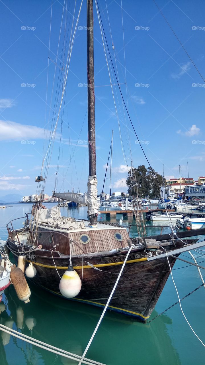 A traditional wooden boat in the port town of Xylokastro,Greece