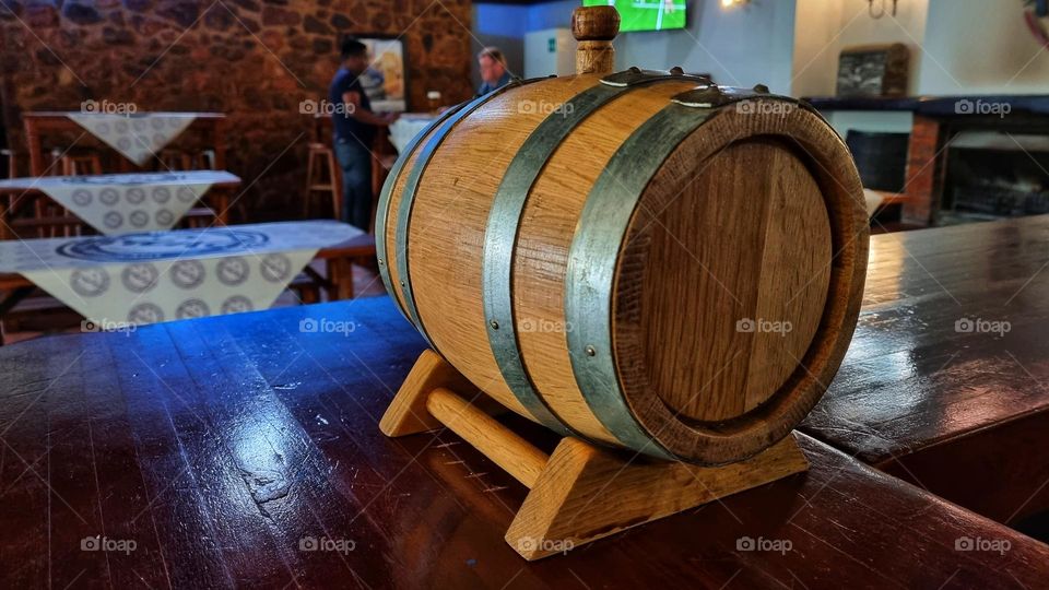 circular shape of a small wine barrel.