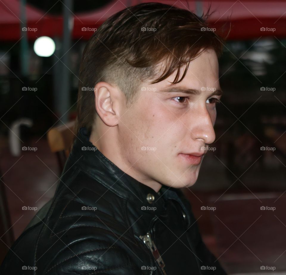 photo portrait of a young man in a jacket