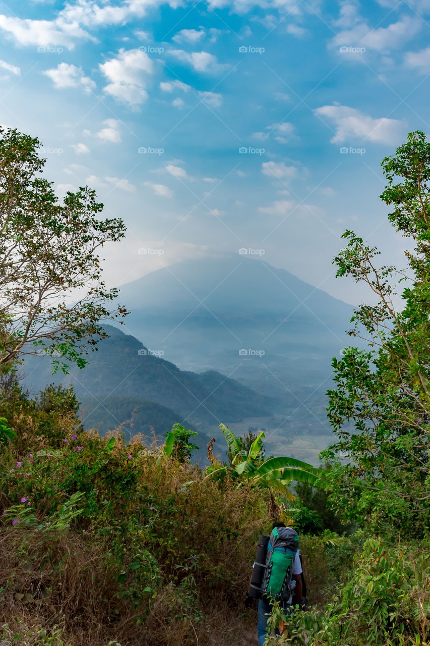 Walking down the hills after having a night camp, such a breathaking view of mountains and beautiful blue sky