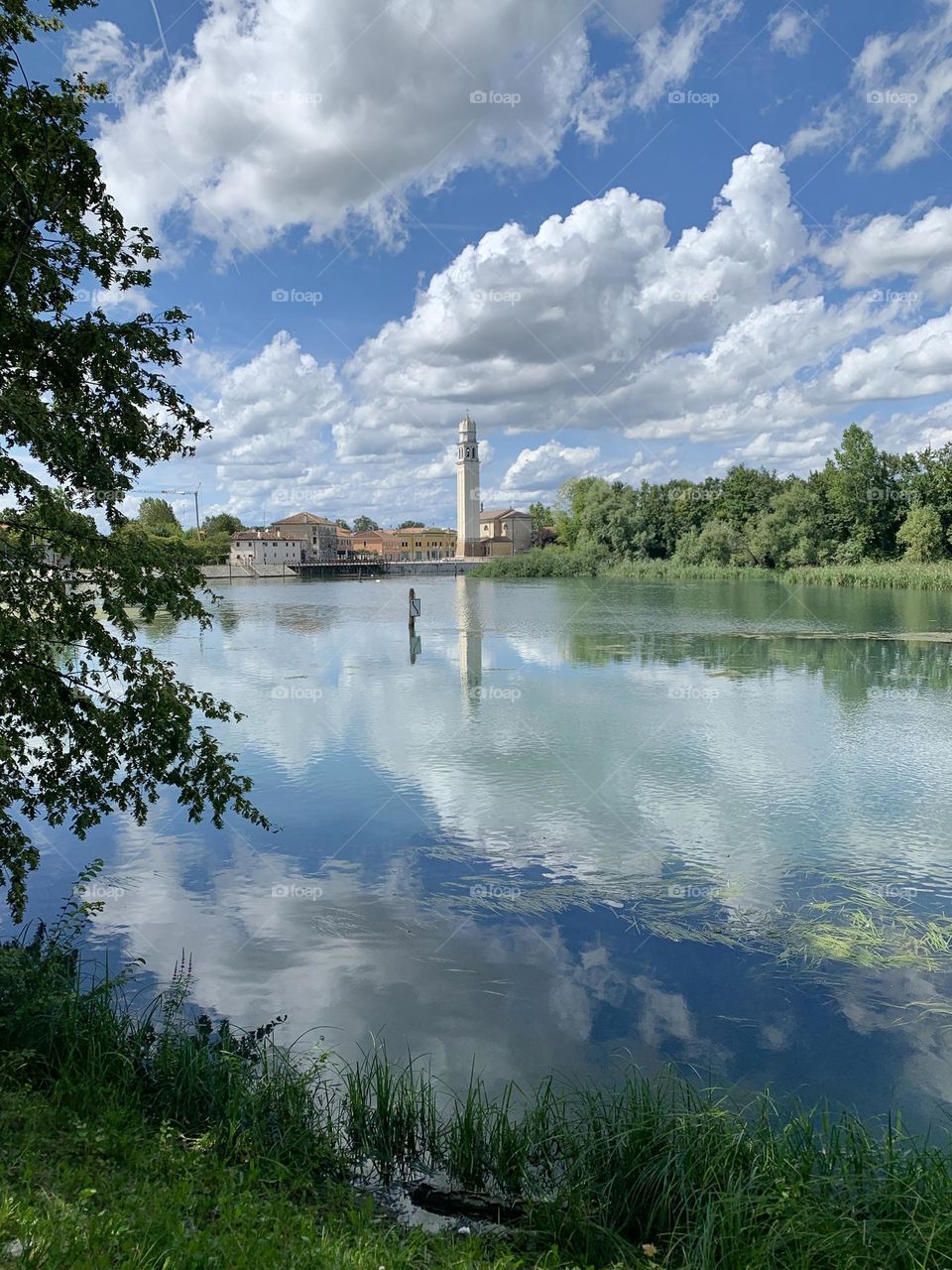 A romantic glimpse of the course of the Sile river on a splendid summer day. This stream is known for being the longest spring river in Italy.