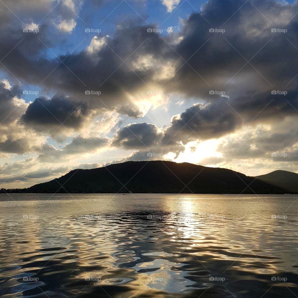 Scenic view of lake against blue sky