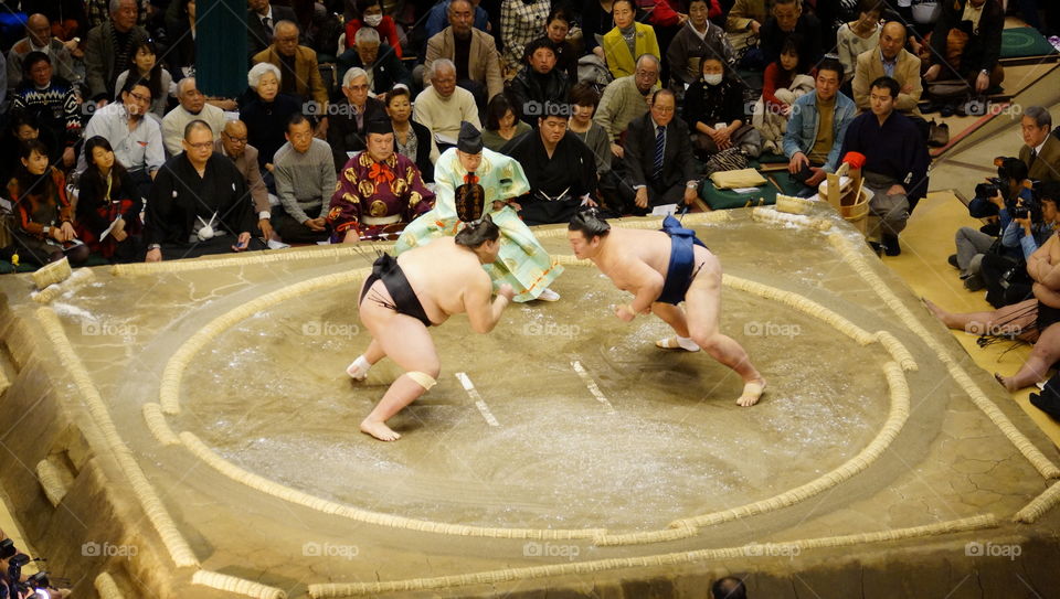 Sumo wrestlers about to clash