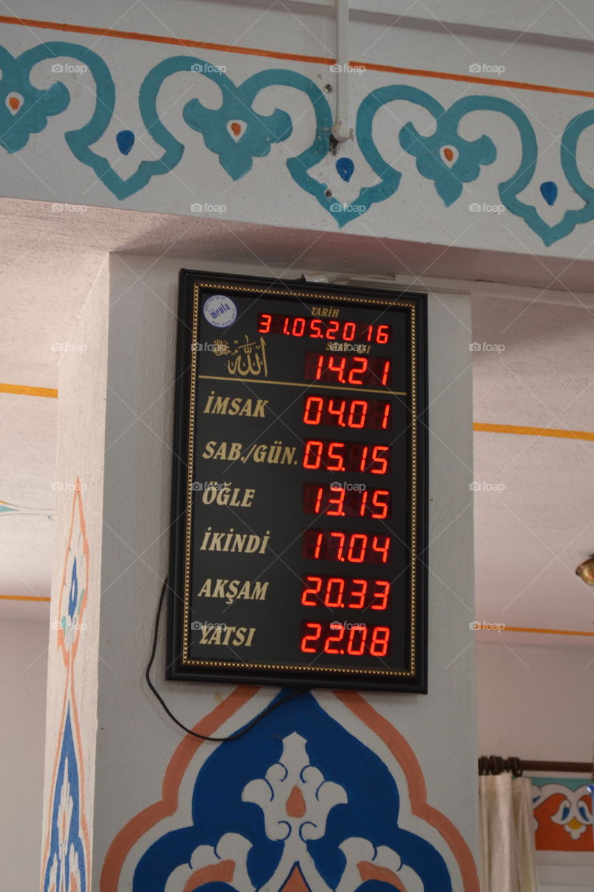 clock in a moske that tells when the sun goes up and down.