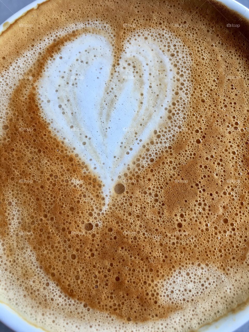 Valentine's Day coffee, heart shape in cream foam in Cafe latte, love, dating, relationships, romance