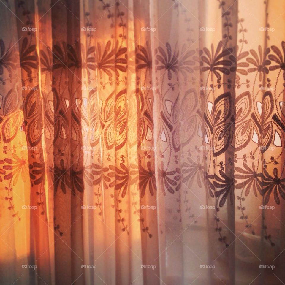 Sunset behind the Curtains 