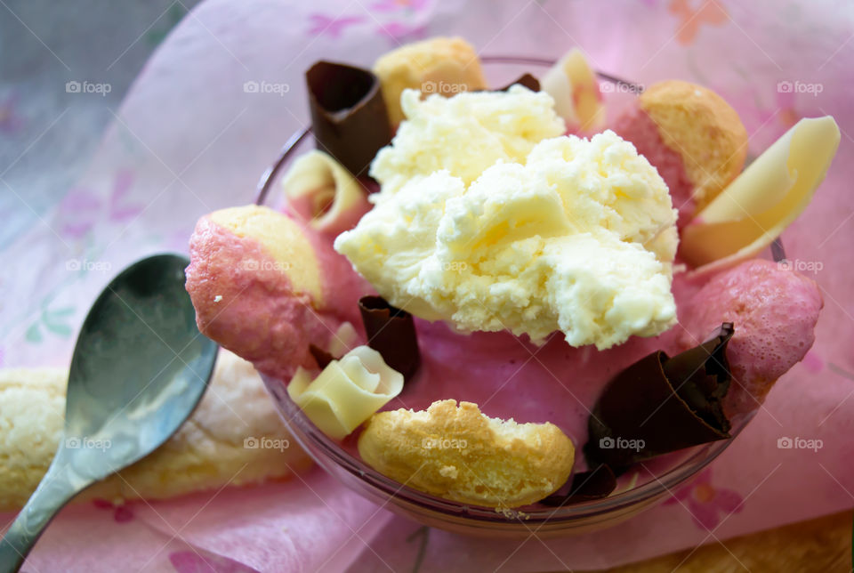 Elevated view of strawberry ice cream in bowl