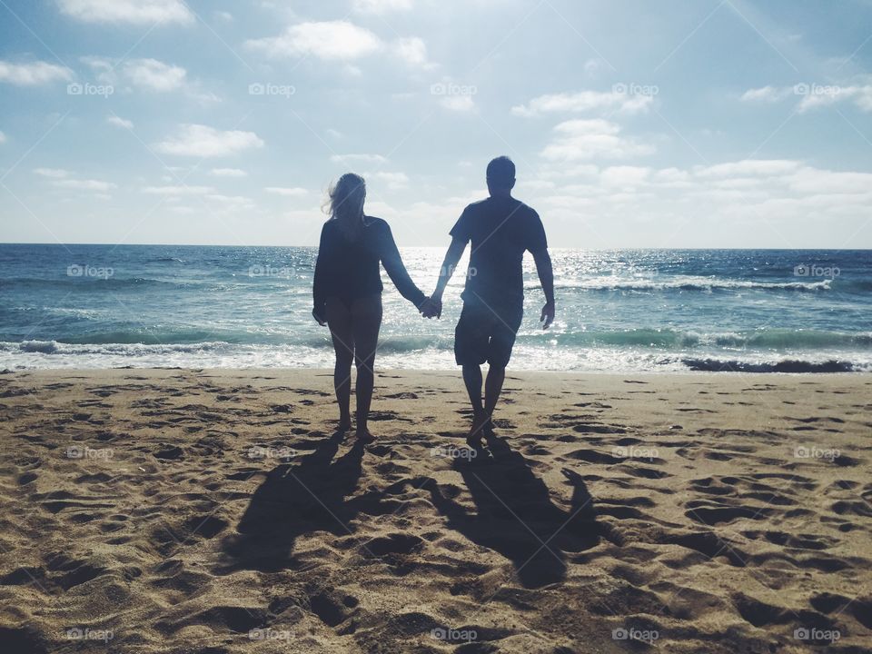 Happy couple on the beach