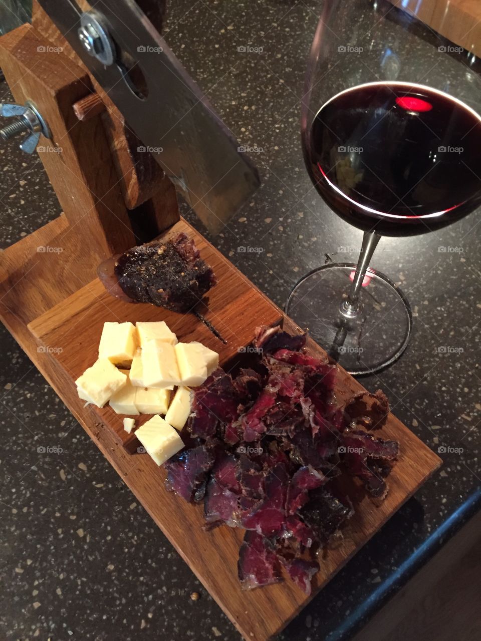South African beef snack called biltong paired with cheese and red wine. 