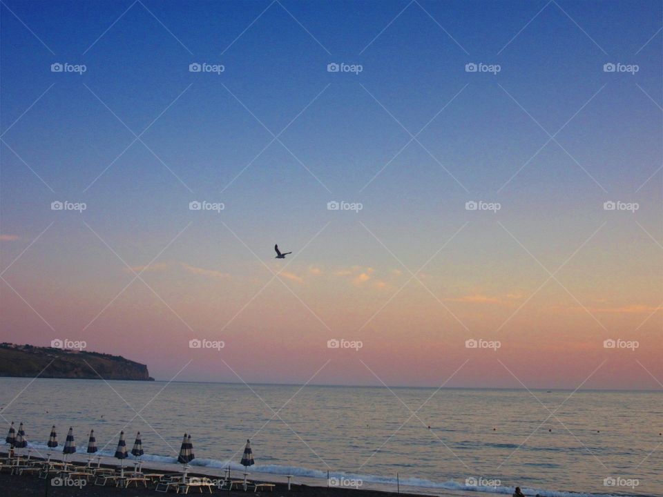 Sunset over Fiuzzi beach (Calabria-Italy)